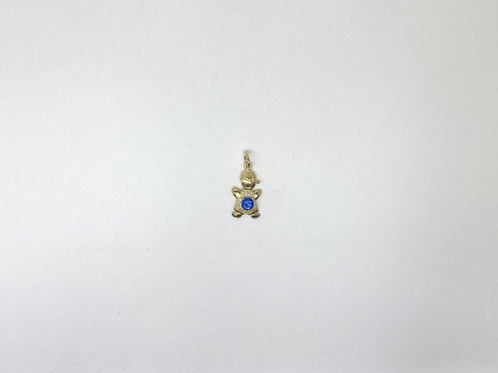 Children's gold pendant with a blue stone