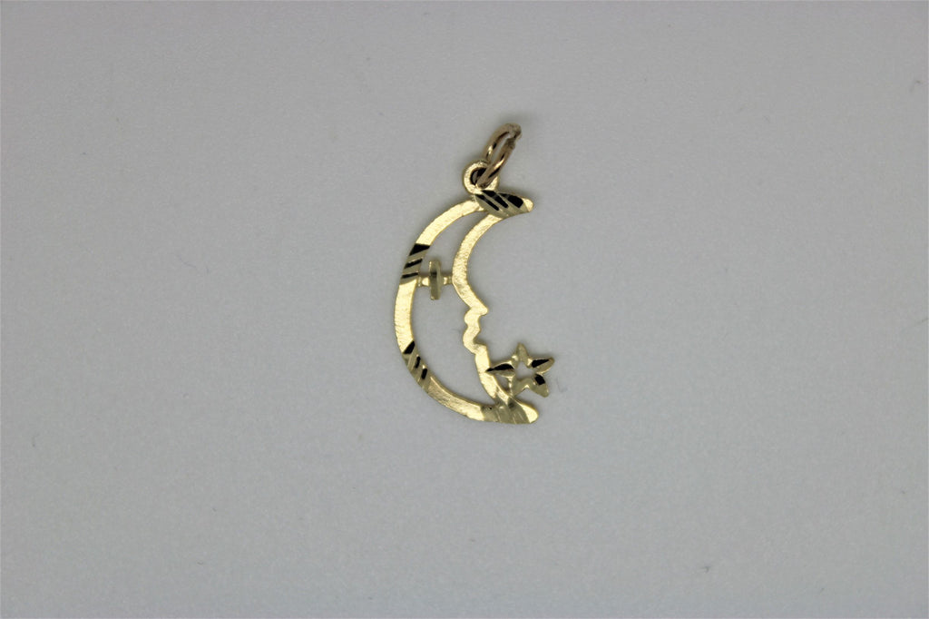 Gold moon pendant