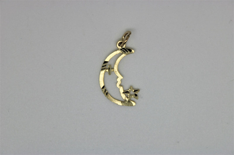 Gold moon pendant