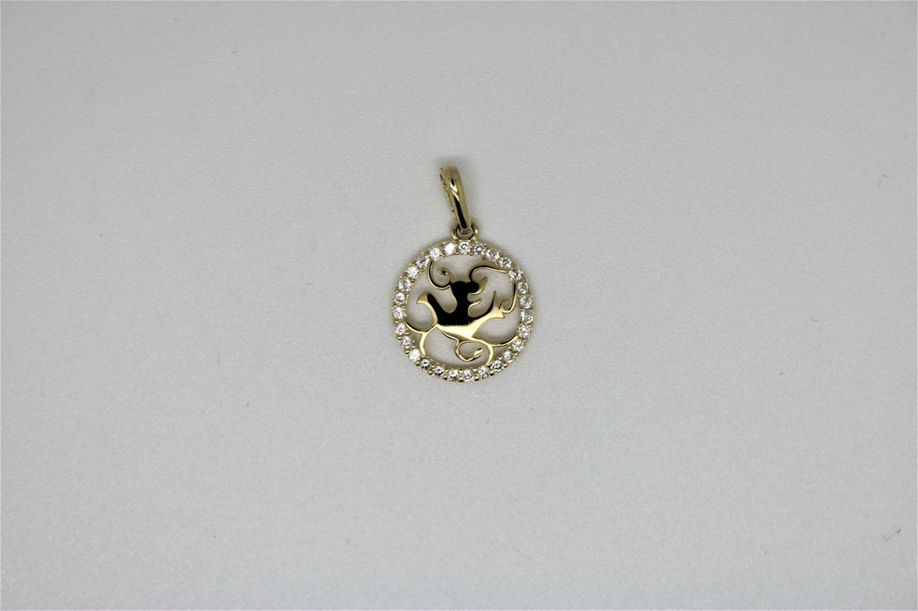 Round gold pendant with stones around