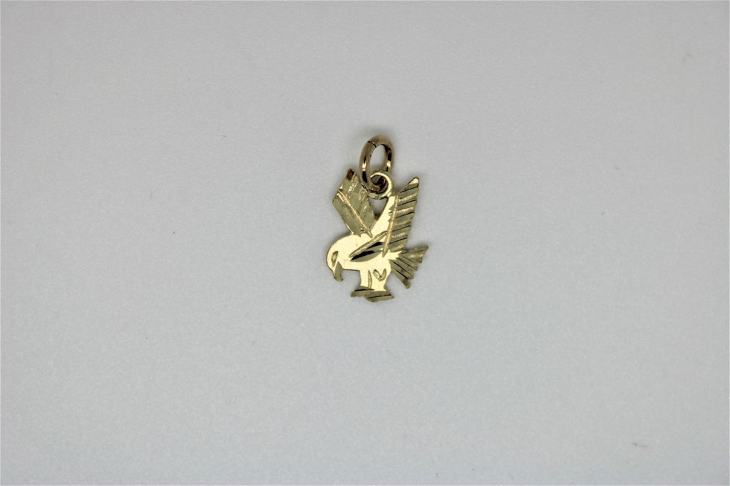 Gold bird pendant