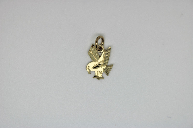 Gold bird pendant