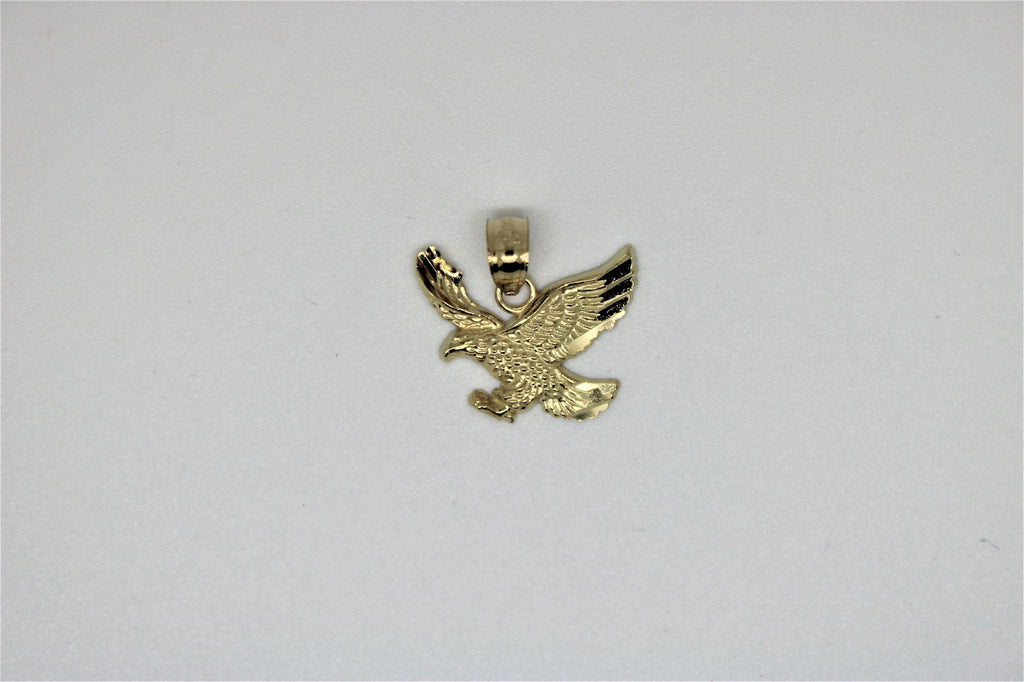 Gold bird pendant