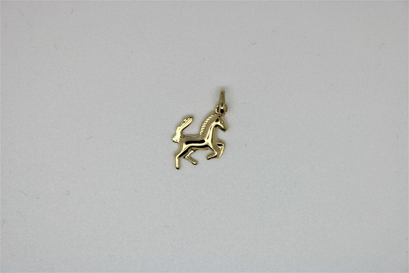 Gold horse pendant