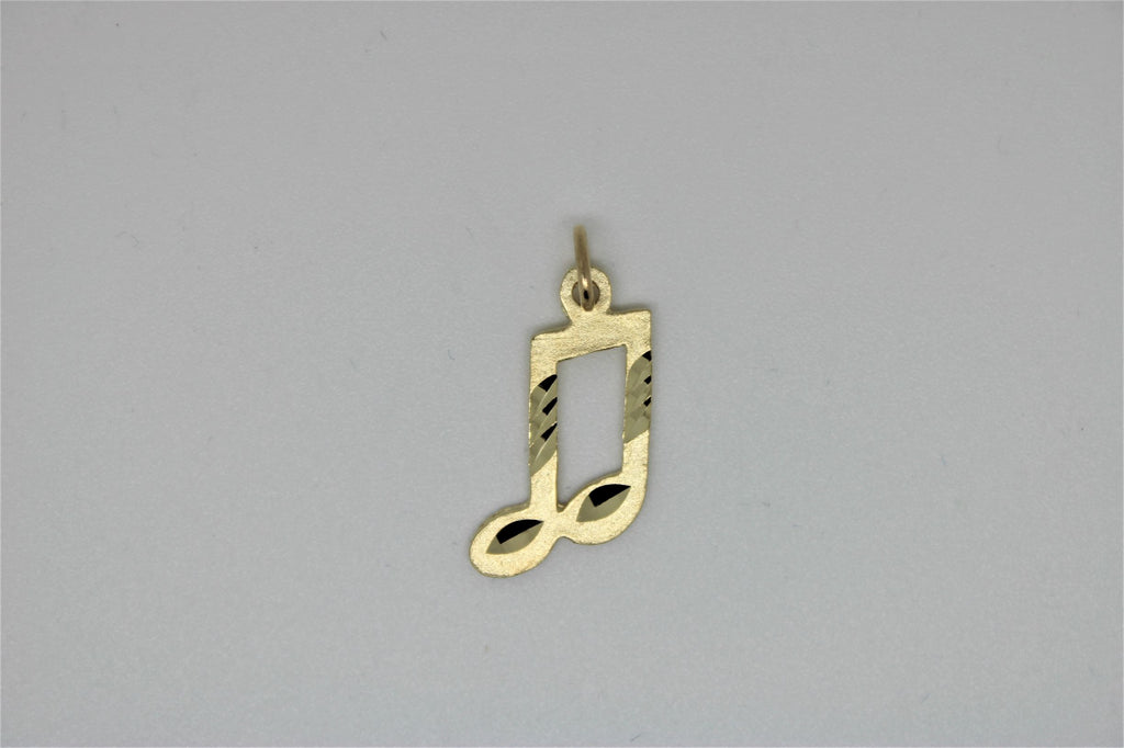 Gold musical note pendant