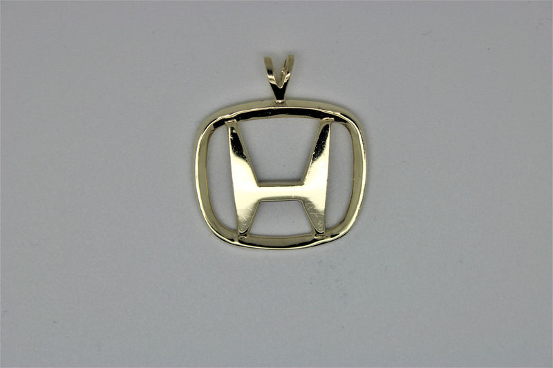 Honda gold pendant