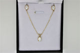 Set of chain, pendant and earrings in gold with opal