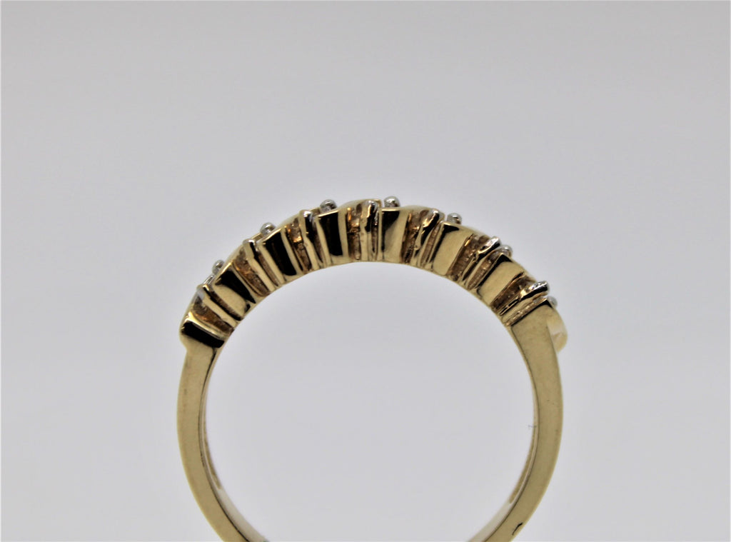 Semi-eternity gold bangle (diamonds)