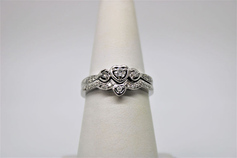 Engagement ring and bangle set in white gold