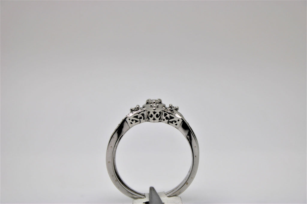 Engagement ring and bangle set in white gold