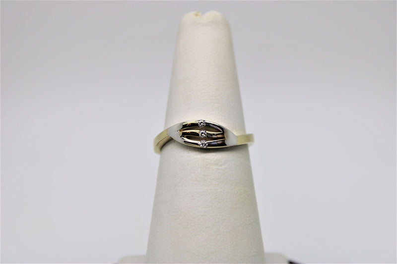 2 tone gold ring with stones