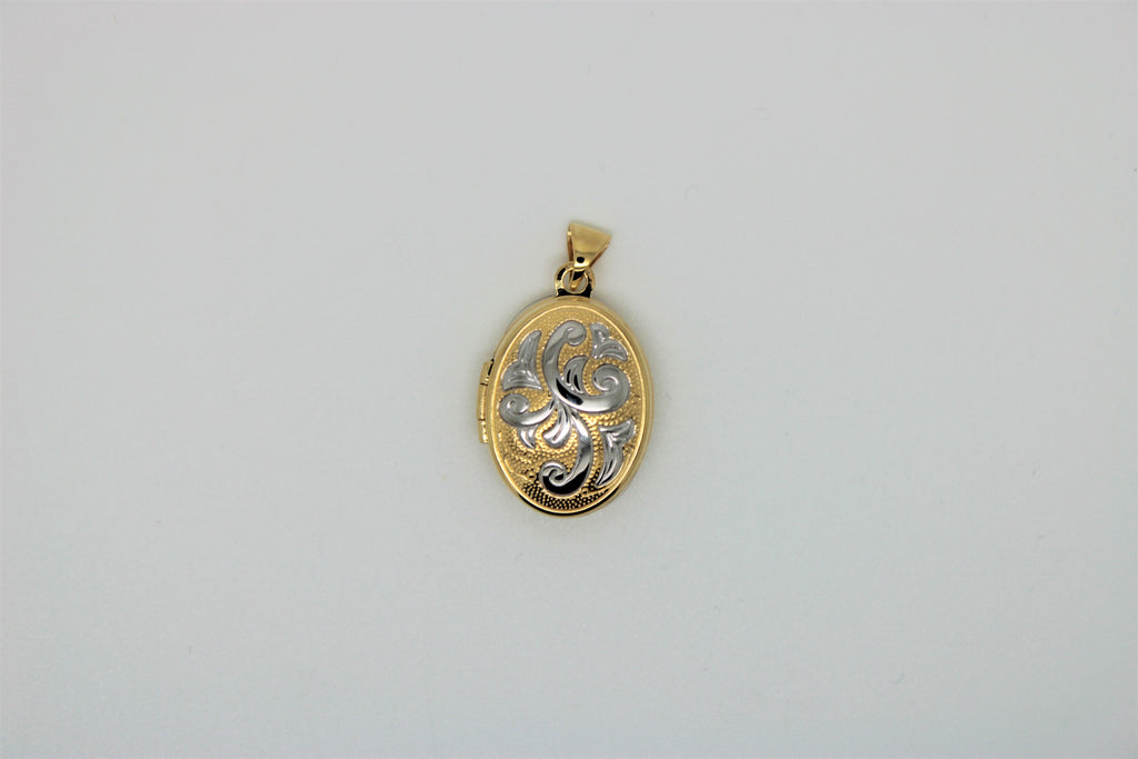 2 tone gold oval pendant with motif
