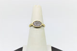 Oval gold ring with stones