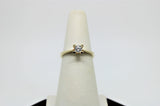 Gold ring with 1 stone in the center