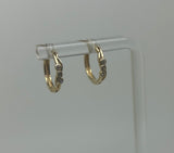 Boucles d'oreilles en or avec 3 pierres