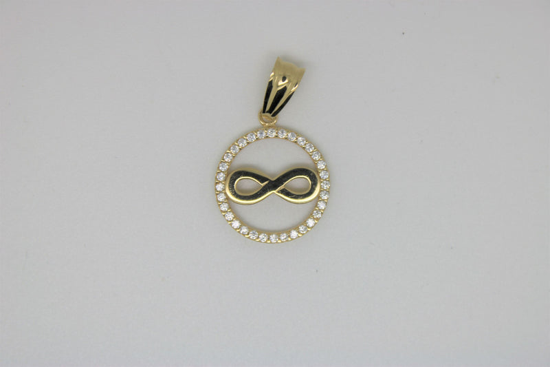 Infinity gold pendant surrounded by stones
