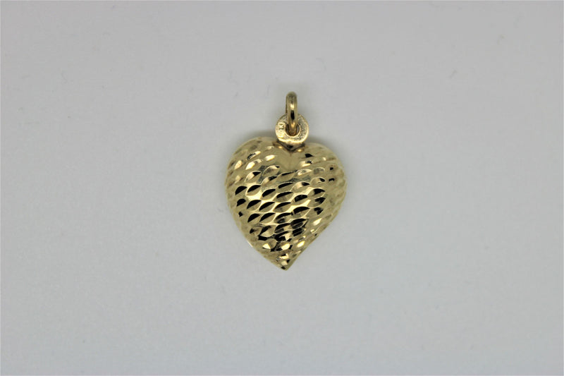 Gold textured heart pendant