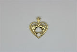 Gold heart pendant with dolphins