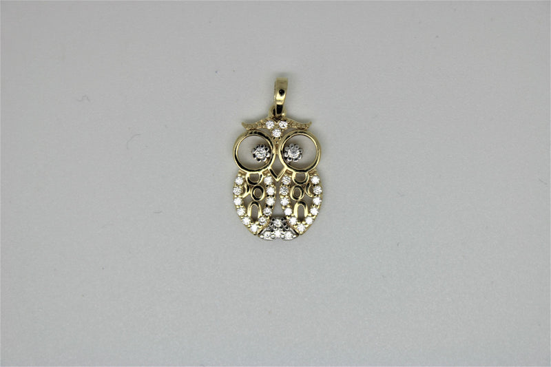 Owl gold pendant with stones