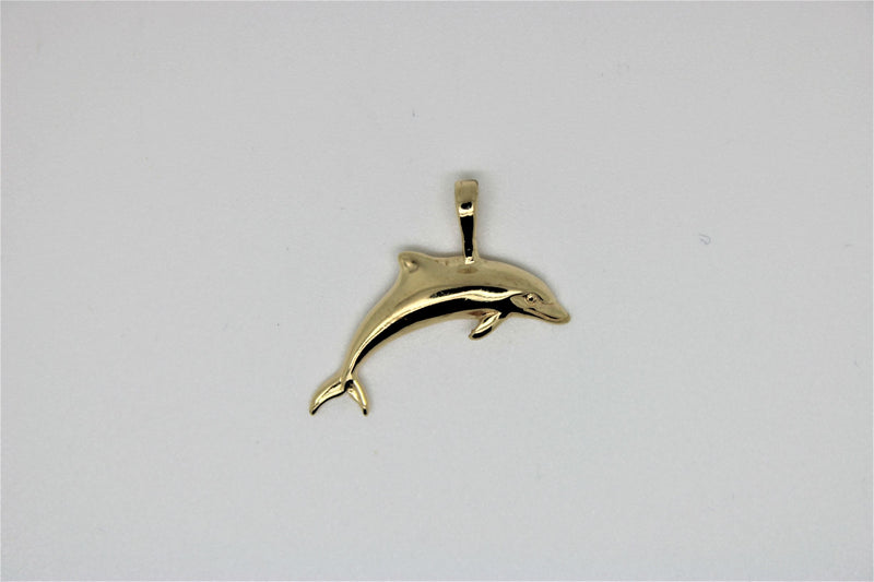 Dolphin gold pendant