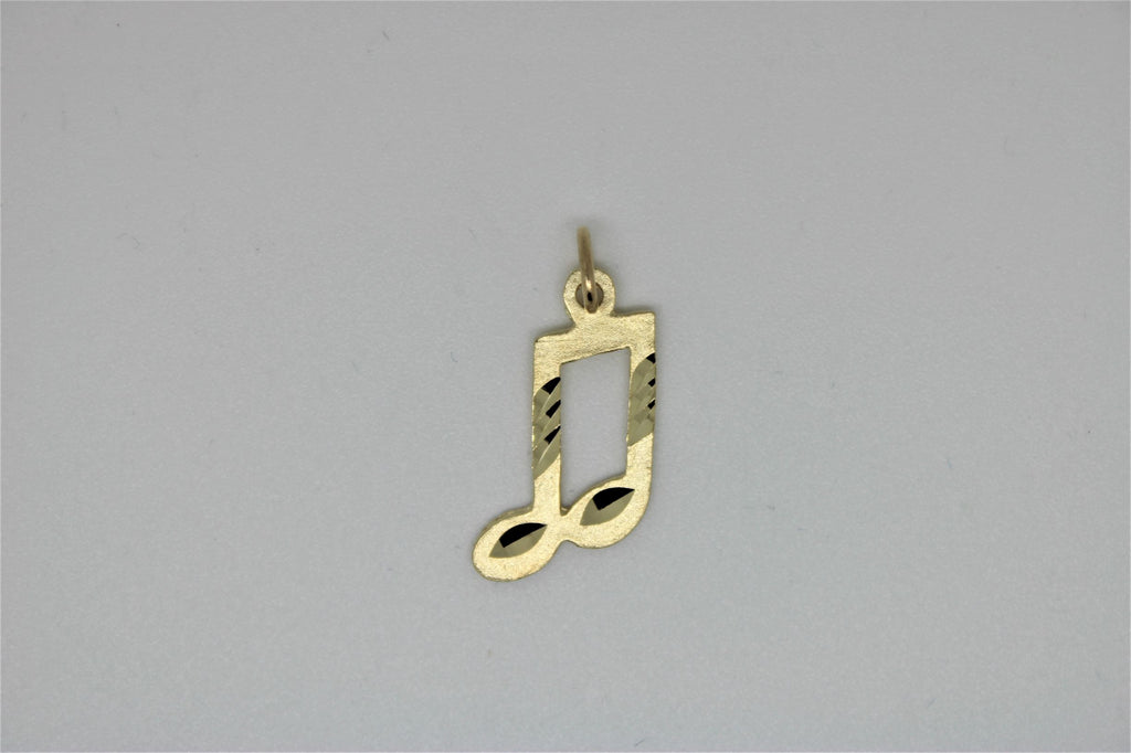 Gold musical note pendant