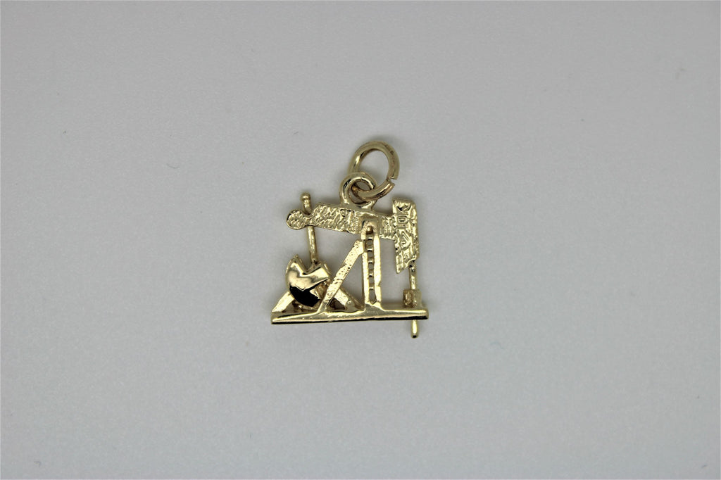 Petroleum gold pendant