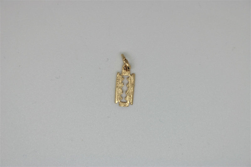 Razor blade gold pendant