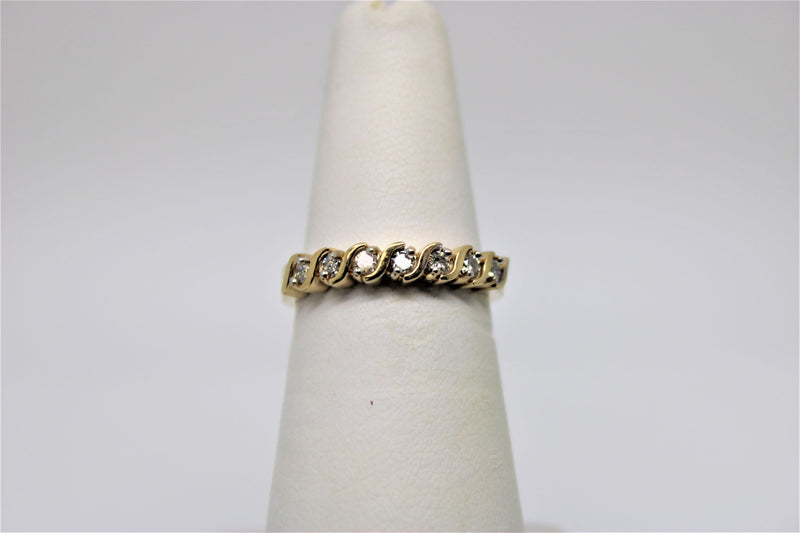 Semi-eternity gold bangle (diamonds)