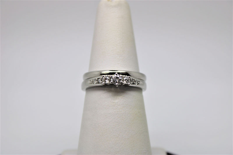 Engagement ring and bangle set in white gold (diamonds)
