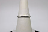 Semi-eternity bangle in white gold (diamonds)