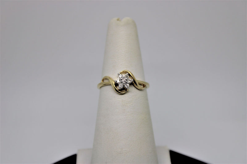 Gold engagement ring with diamonds