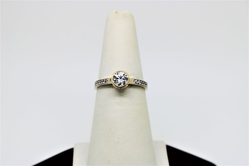 Gold ring with a stone in the middle