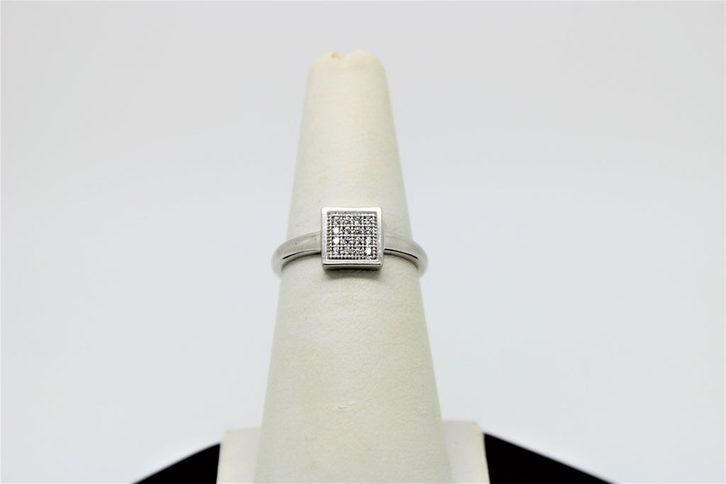 Square white gold ring with stones