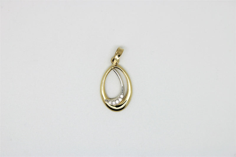 2 tone oval gold pendant wtih stones
