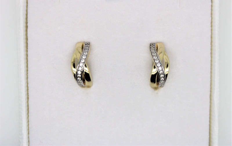 2 tone gold earring with a row of stones