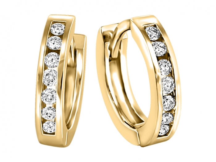 Huggies en or avec pierres blanches